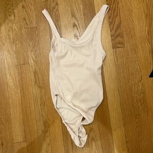 Asymmetrical peach colored Zara bodysuit